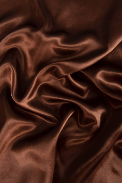 istock Abstract chocolate background, brown abstract satin silk 1281821760