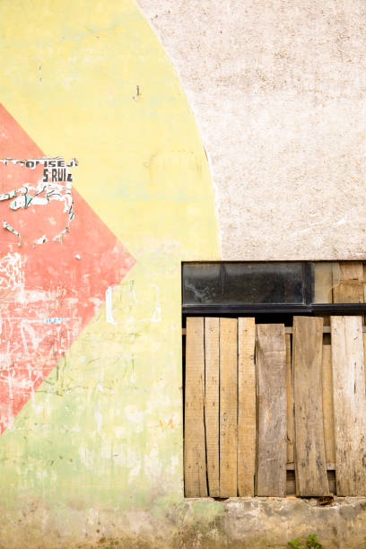 istock Image of window blocked with wood pieces. 1281822190
