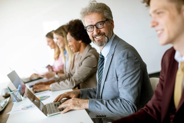 istock Multiethnic business people working together in the office 1281823662