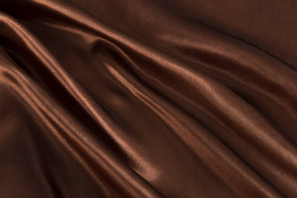 istock Abstract chocolate background, brown abstract satin silk 1281823969