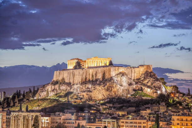 istock Acropolis with Parthenon temple against sunset in Athens, Greece 1281823977