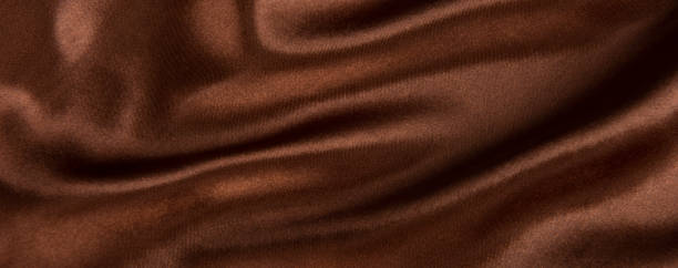 istock Abstract chocolate background, brown abstract satin silk 1281826225