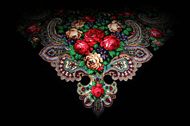 The beautiful rose and paisley patterns on my cotton Russian shawl look vibrant against this black background.