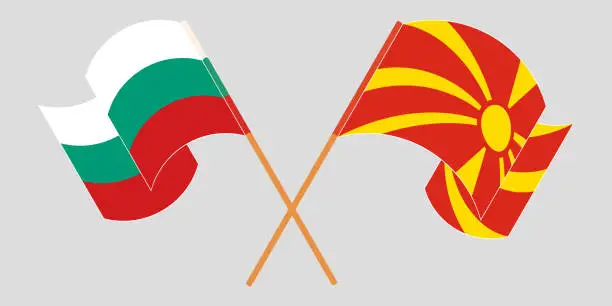 Vector illustration of Crossed and waving flags of North Macedonia and Bulgaria