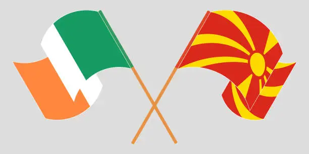 Vector illustration of Crossed and waving flags of North Macedonia and Ireland