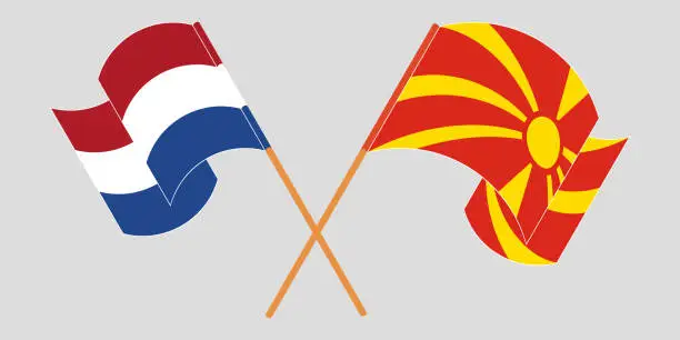 Vector illustration of Crossed and waving flags of North Macedonia and the Netherlands