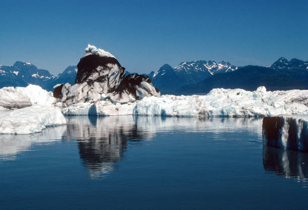 istock Alaska - Prince William Sound - Blackened Ice Mound - 1997 1281833377
