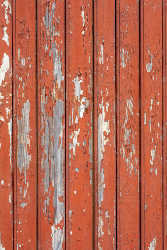 a red barn old retro vintage wood board peeling paint weathered house wooden farm building
