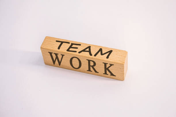 istock Team Work - Wood block stacking with icon leader business. Key success factors for leadership elements concept 1281838005