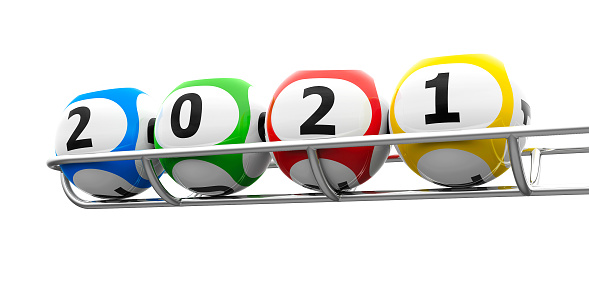 Six falling lottery balls with random numbers on a dark background