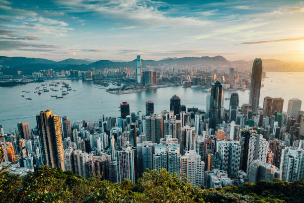 istock Hong Kong skyline at sunrise 1281839678
