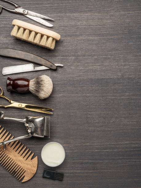 istock Classic grooming and hairdressing tools on wooden background. 1281839866