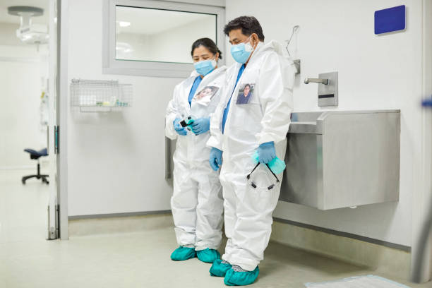 istock Tired doctors by sink in hospital during COVID-19 1281840224