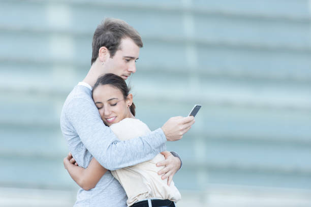 istock Young couple with a phone 1281842625