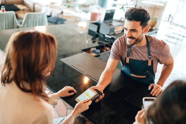 istock Contactless payment in coffee shop 1281845479