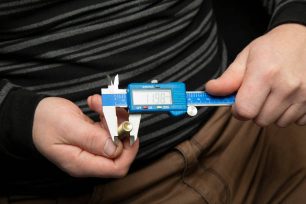 istock Digital caliper in the hands of the master. 1281852419