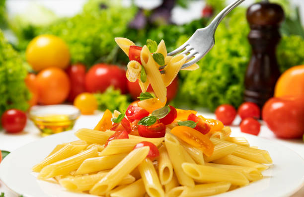 a plate of pasta and a noodle