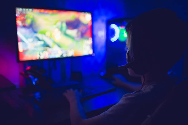 istock Teenager playing video game on PC 1281857476