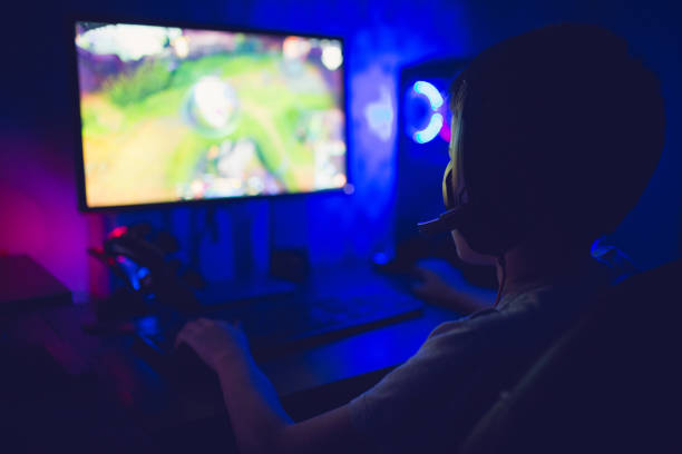 istock Teenage boy addicted to video 1281857522