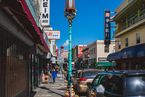 29 March 2019 - San Francisco, USA: Pedestrians walking down streets of San Francisco Chinatown