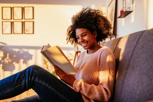istock African student reading book at home 1281862149