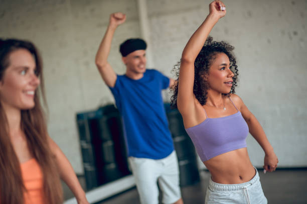 istock Group of people enjoying their dance class 1281862699