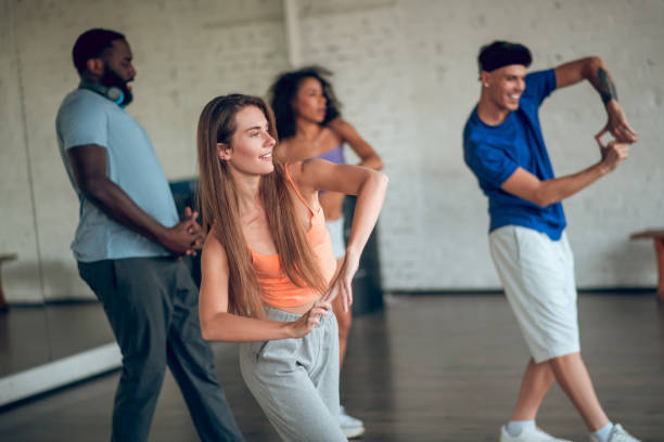 istock Group of people learning new movements during th dance class 1281862711