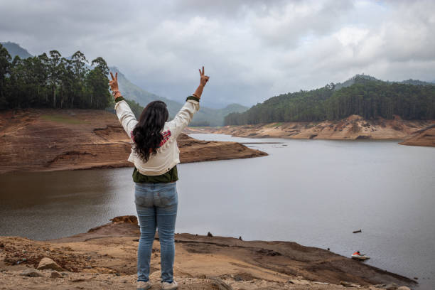 istock girl thinking and feeling the true nature at the lakeside 1281863648