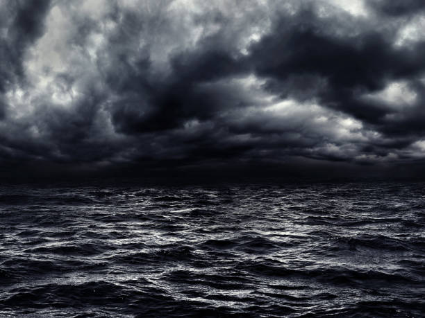 Photo of dark stormy sea with a dramatic cloudy sky