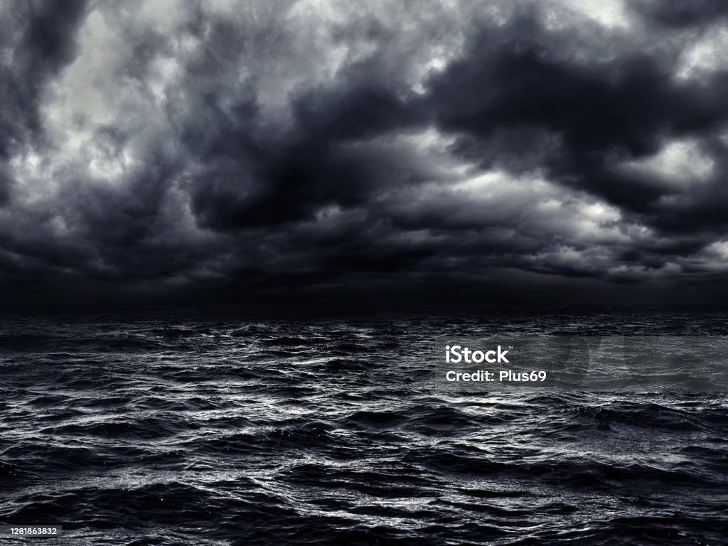 dark stormy sea with a dramatic cloudy sky Storm Stock Photo
