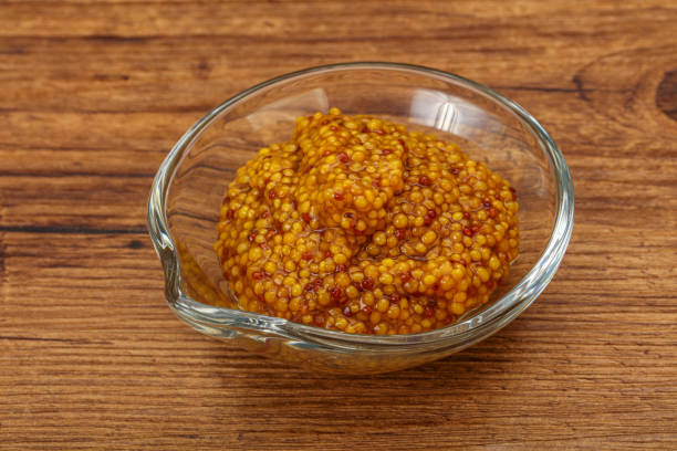 istock Dijon mustard sauce with seeds 1281865043