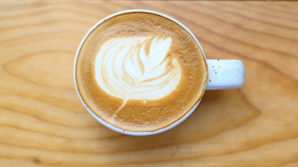 istock A cup of Hot latte art on wooden table. 1281865318
