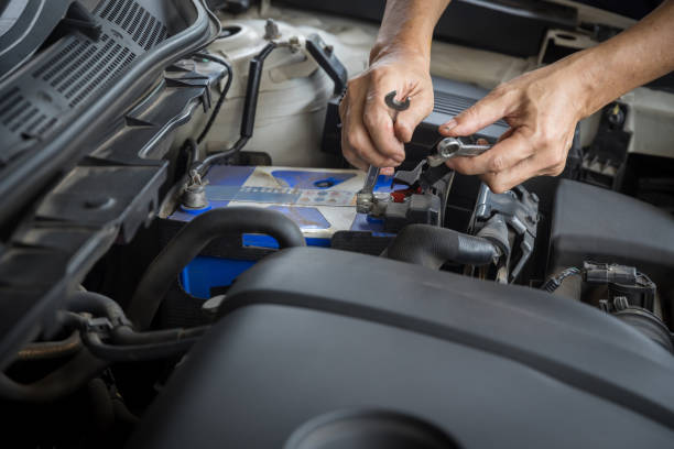 istock Engine engineer is replacing  car battery because car battery is depleted. concept car maintenance And the cost of car care. 1281868998