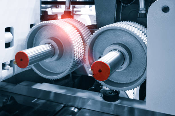istock Crossing of the roller sawmill conveyor, Production line conveyor roller transportation objects. 1281871259