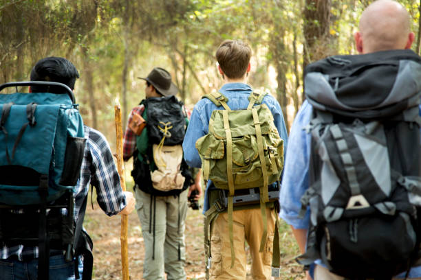 istock Four multi-ethnic guys enjoying a hiking and camping trip. 1281873536