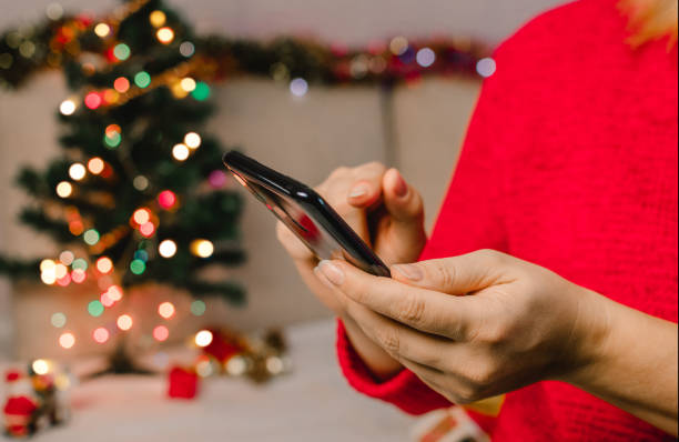 istock Unrecognizable woman Hands Using mobile for online shopping - Close Up. 1281873659