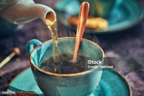 Cup Of Black Tea Served With Biscuits Stock Photo - Download Image Now - Tea - Hot Drink, Tea Crop, Afternoon Tea