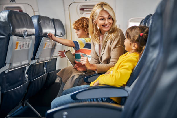 istock Excited mother with a tablet exchanging smiles with her daughter 1281875468