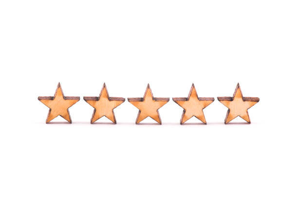 istock Five wooden stars on white background 1281876967