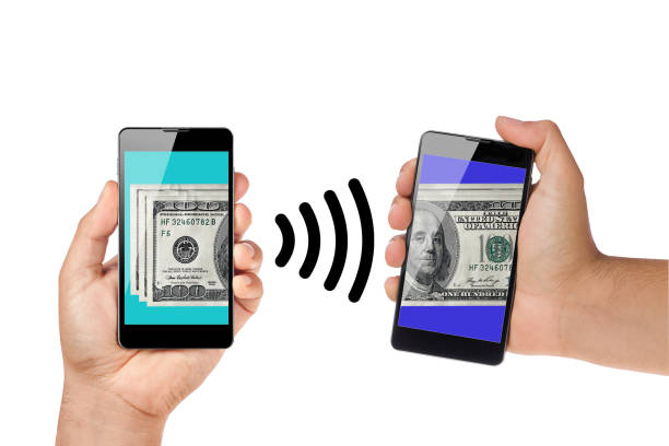 money dollars transfer between mobiles or smartphone isolated on white. Contactless payment NFC money dollars transfer between mobiles or smartphone isolated on white. Contactless payment NFC sending money stock pictures, royalty-free photos & images