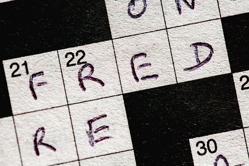 Close-up of a crossword puzzle on the name 