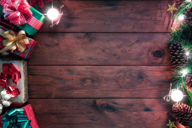 istock Christmas lights and decoration with presents making a frame with copy space. Christmas themes. 1281880781