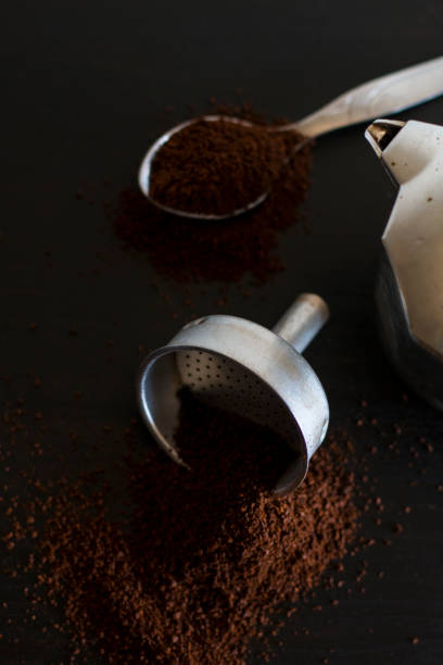 istock Ingredients for making moka coffee. Moka pot with coffee, coffee beverage. 1281880851