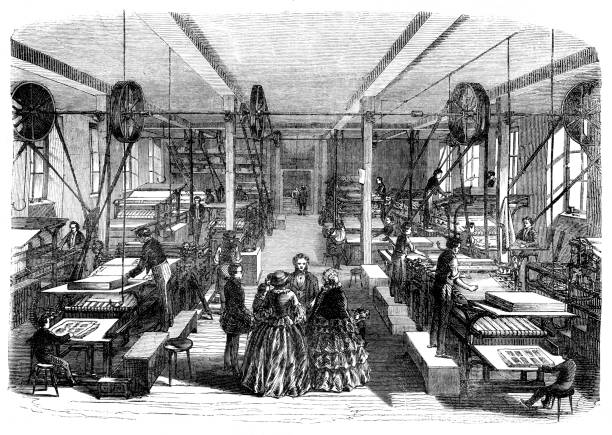 istock People working at a printing press in workshop at publisher 