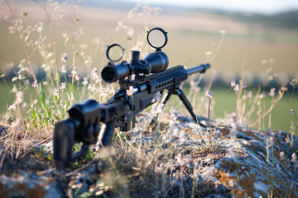 istock sniper rifle with bipod on combat position 1281890089