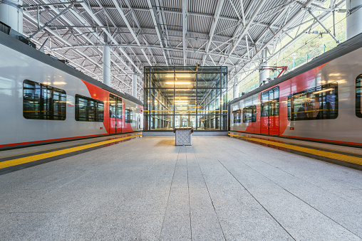 Roza Khutor station, Russia - October 19, 2019: Passenger trains to Sochi stand by the platform before departure.