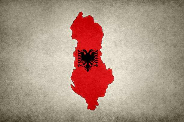 Grunge map of Albania with its flag printed within its border on an old paper.