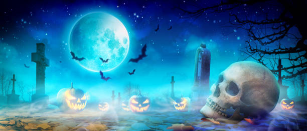 istock Scary halloween night with scull and crow in the graveyard. 1281894335