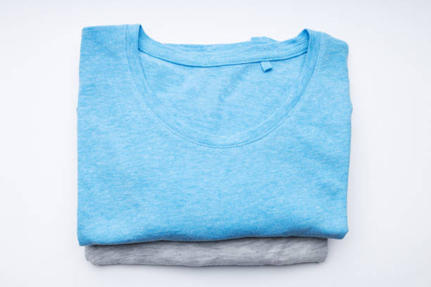 istock blank folded t-shirt on a white background. branding template. above view 1281898006