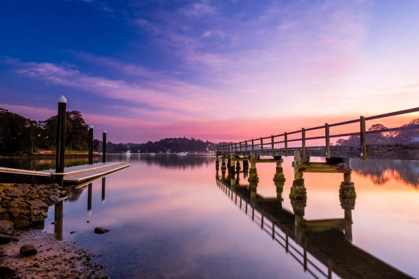 istock Twilight over Carina Bay Jetty Pier in Como 1281900774